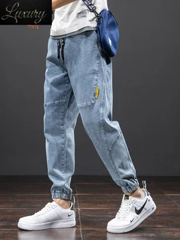אביב קיץ מוצק כותנה קליל באגי ג 'ינס גברים ג' ינס רצים אופנת רחוב הרמון מכנסיים מכנסיים גדול מידה 6XL 7XL 8XL